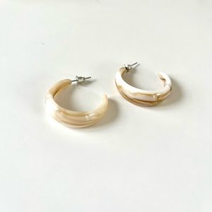 Translucent huggie hoop earrings white